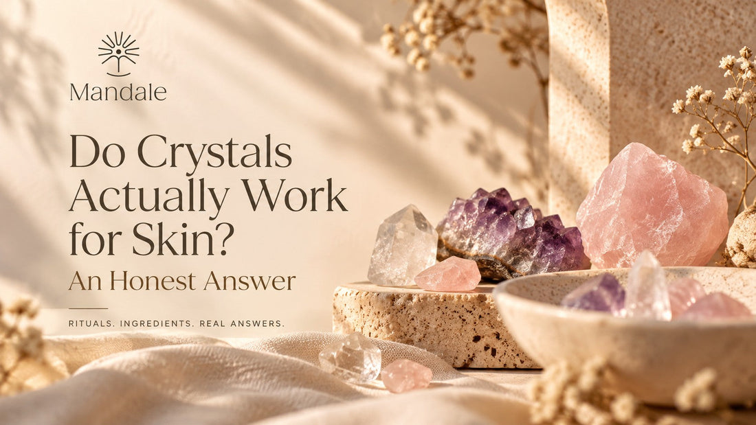 Rose quartz, amethyst and clear quartz crystals on a stone plinth with dried flowers, for the question do crystals actually work for skin